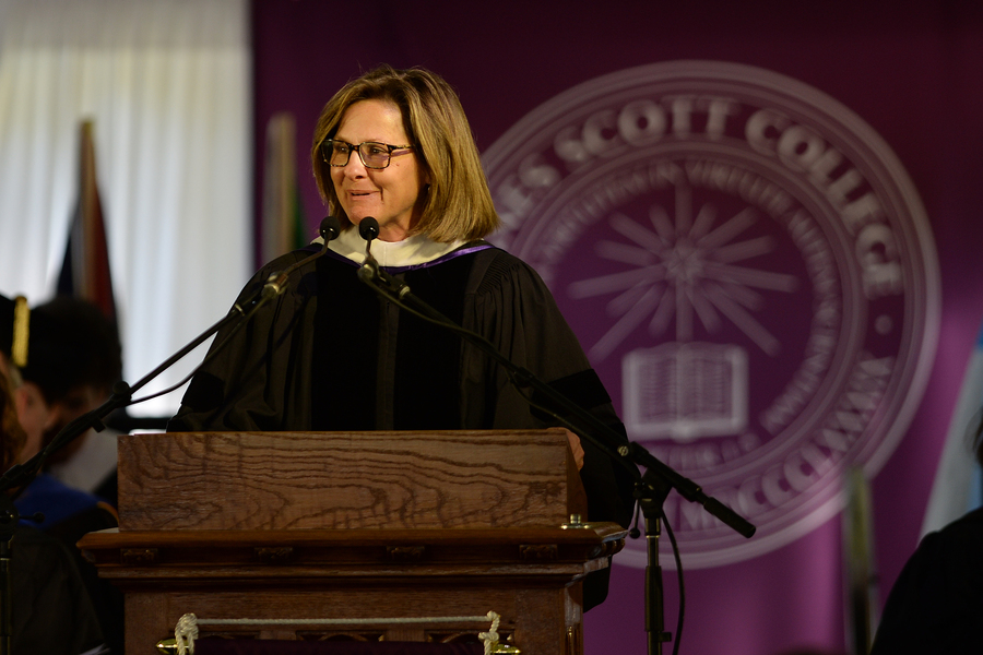 beth holder standing at podium