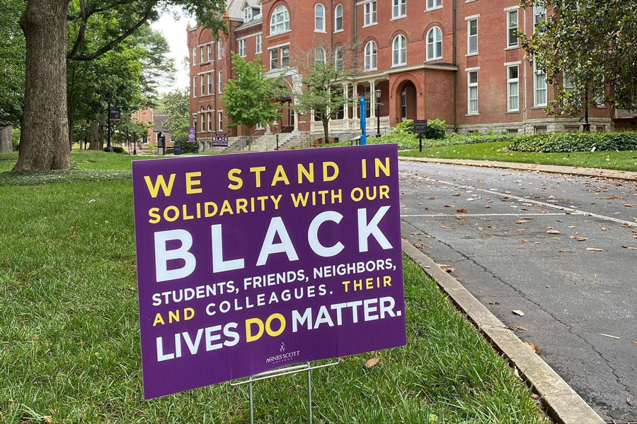 A sign reading "We stand in solidarity with our Black students, friends, neighbors, and colleagues. Their lives do matter."