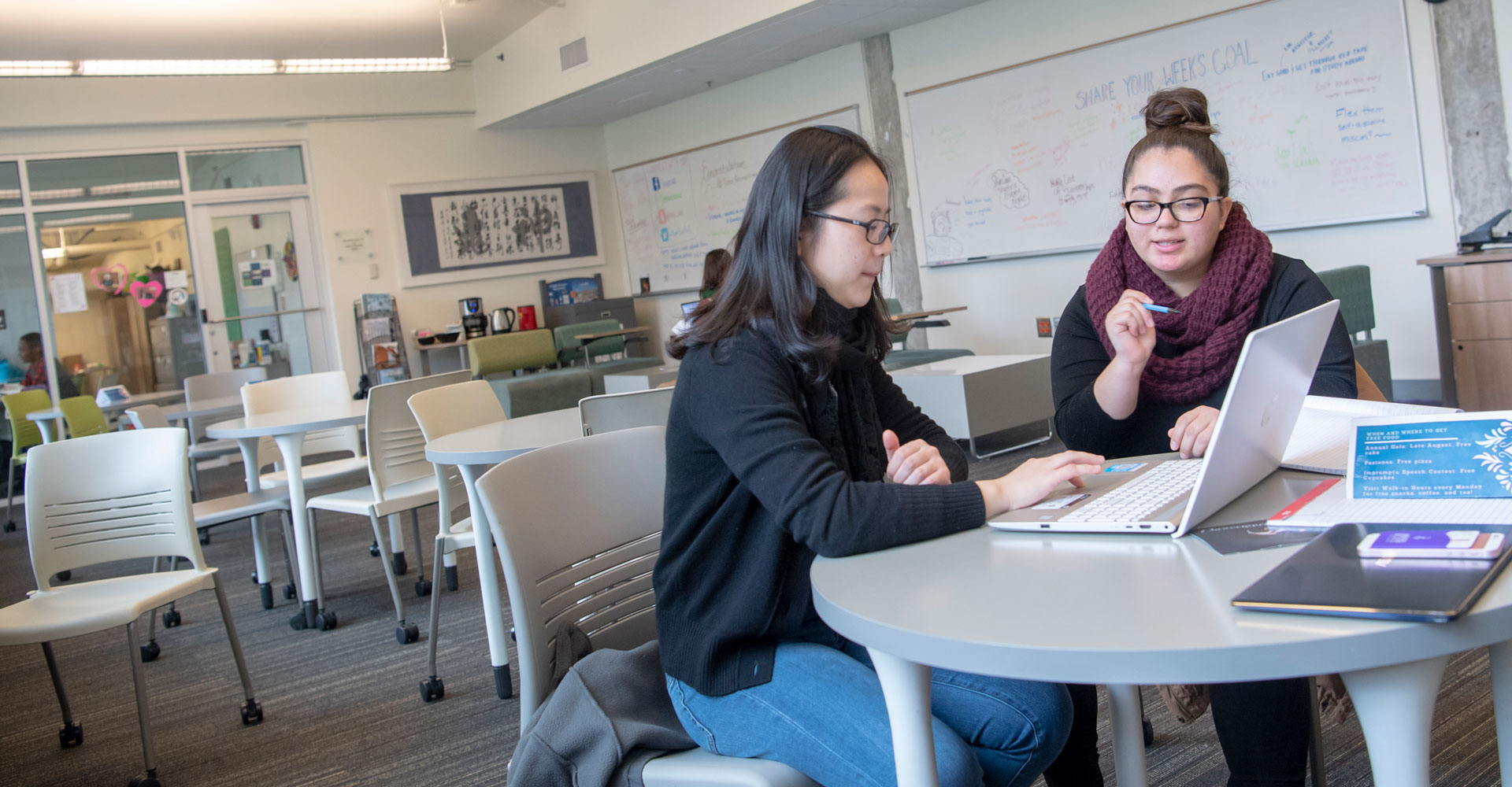 two women reviewing an assignment