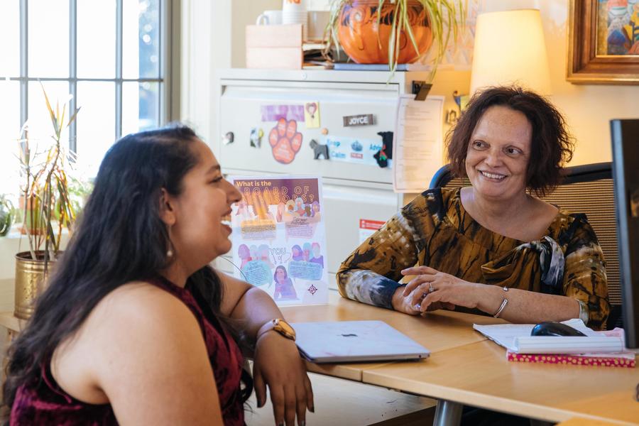 A student talks with an advisor