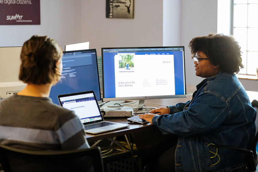 Two students on computers