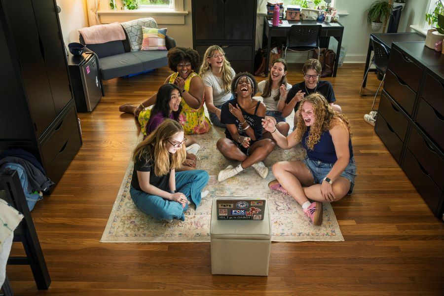 Students sitting in a residence hall
