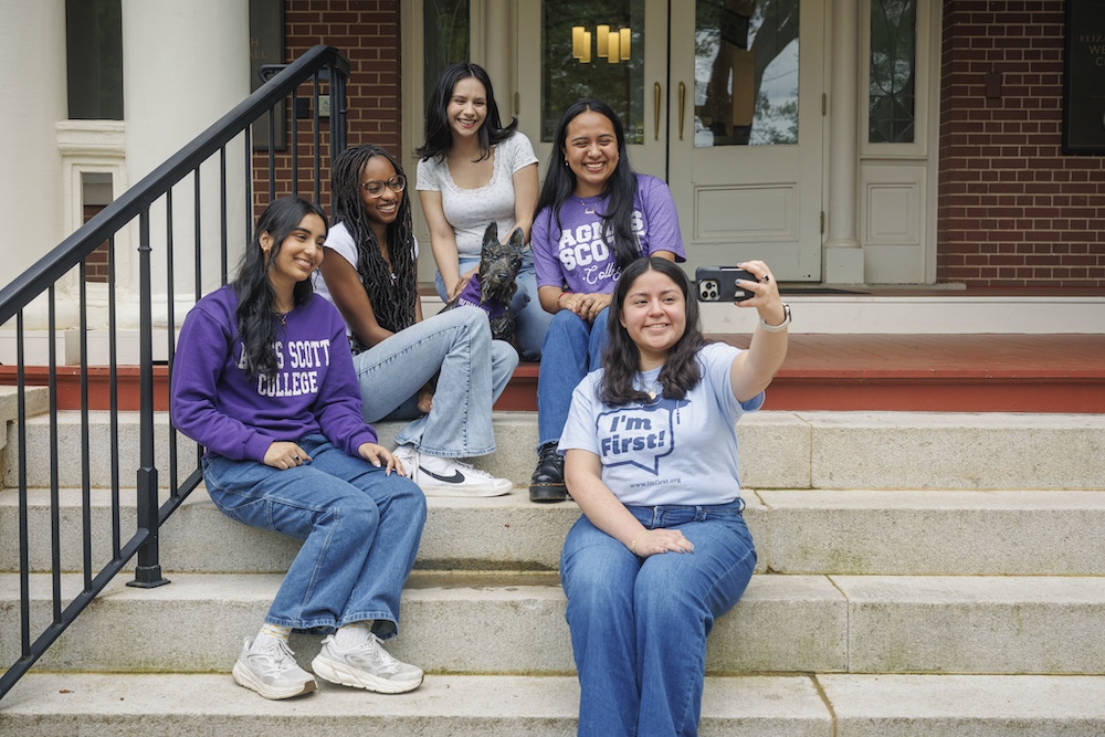 Students sitting on steps