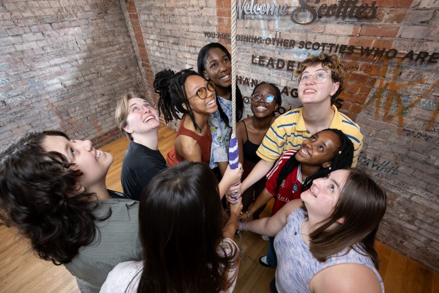 Students ringing the bell