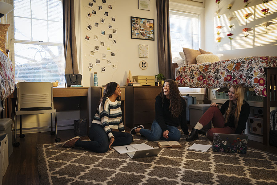 Students sitting in a residence hall