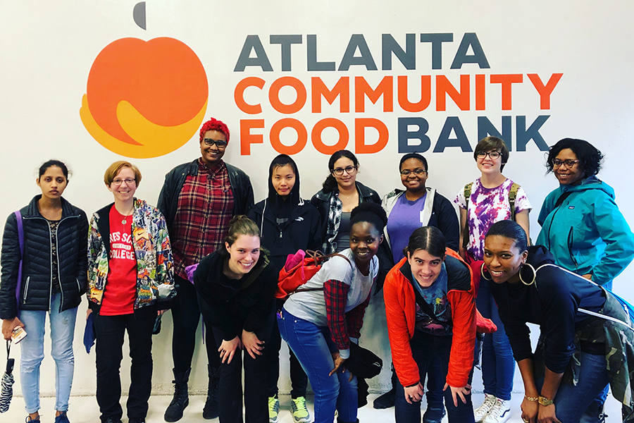Group of students in front of ATL Food Bank sign