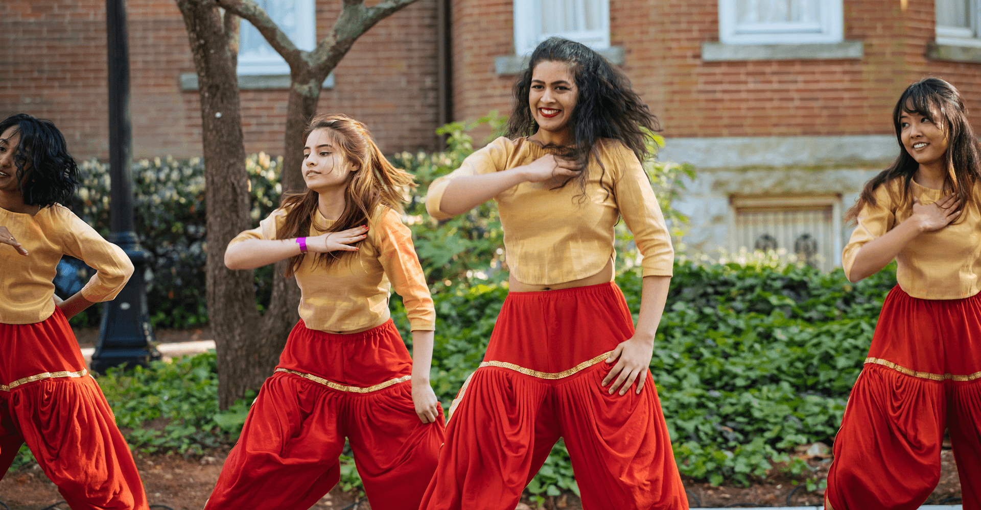 female students dancing