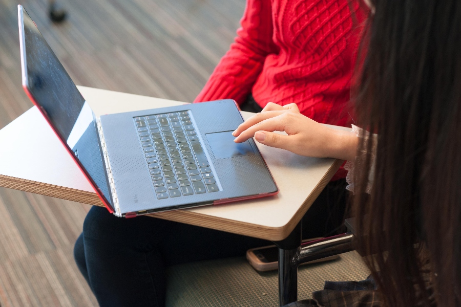 Hands at a laptop