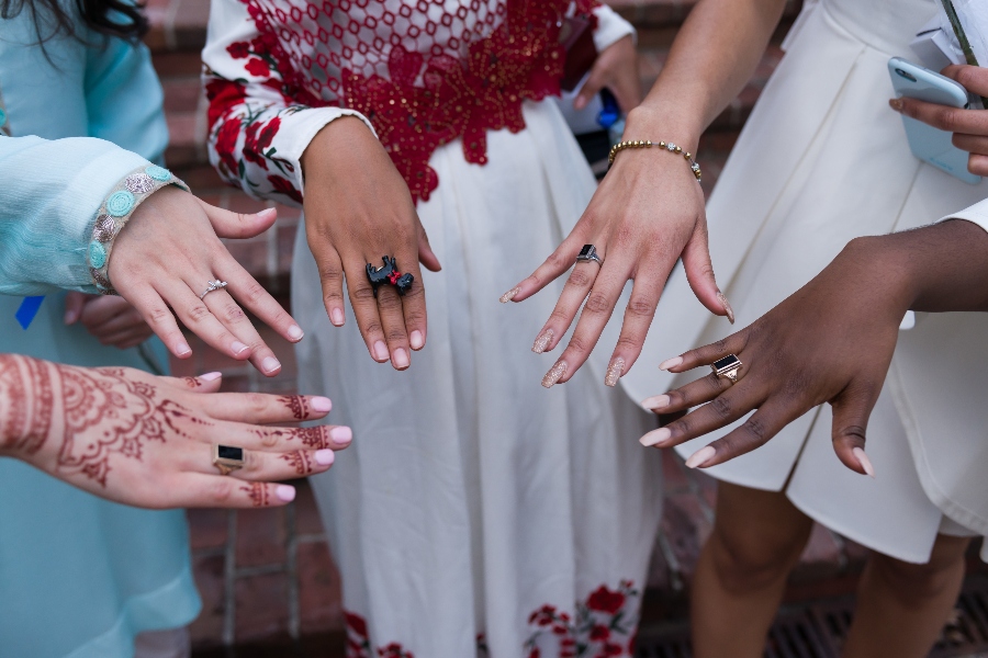 Students showing off their black onyx rings.