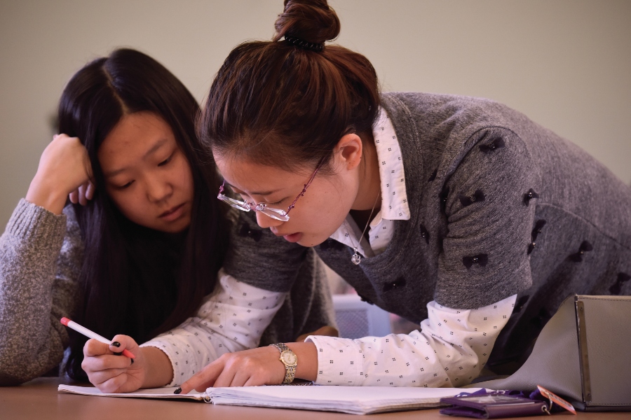 Two students work on a homework problem
