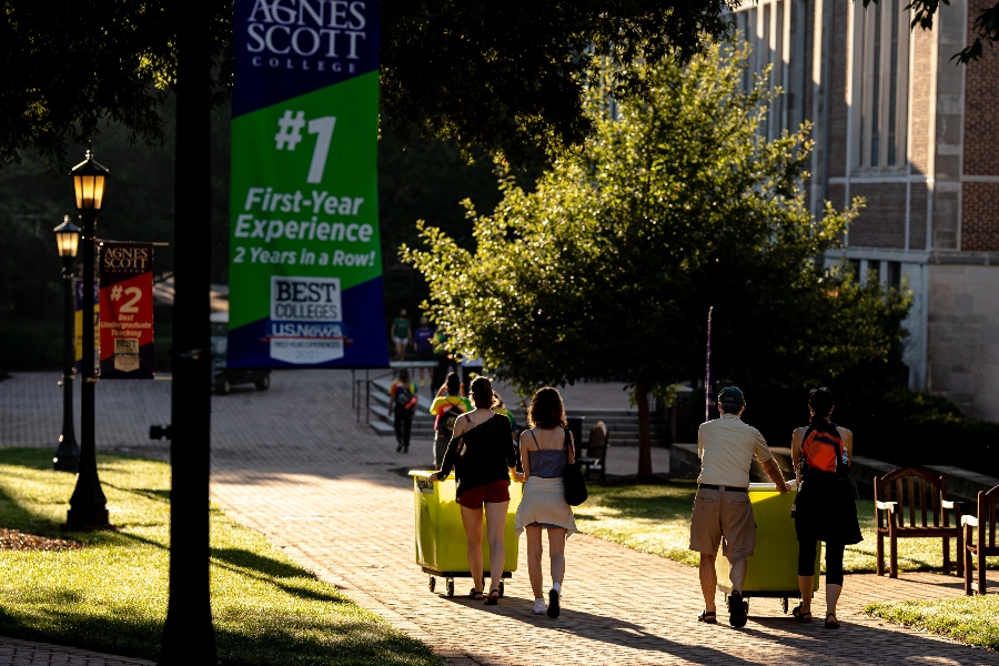 families of first-year students make their way down the main path of Agnes Scott College