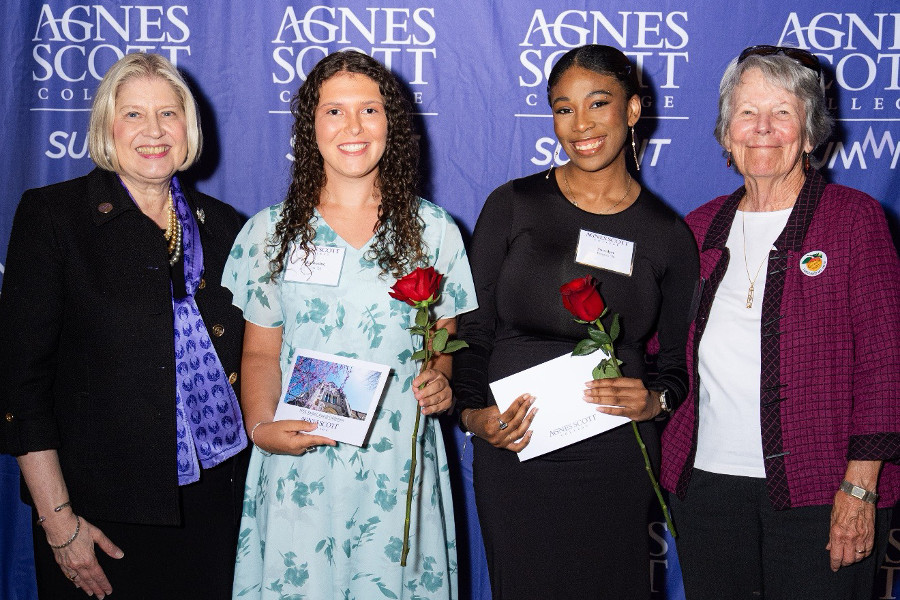 A student award recipient poses with family members, donors, and college representatives at the 2026 Student Award Celebration. The group smiles together while recognizing the student’s achievements and accomplishments.