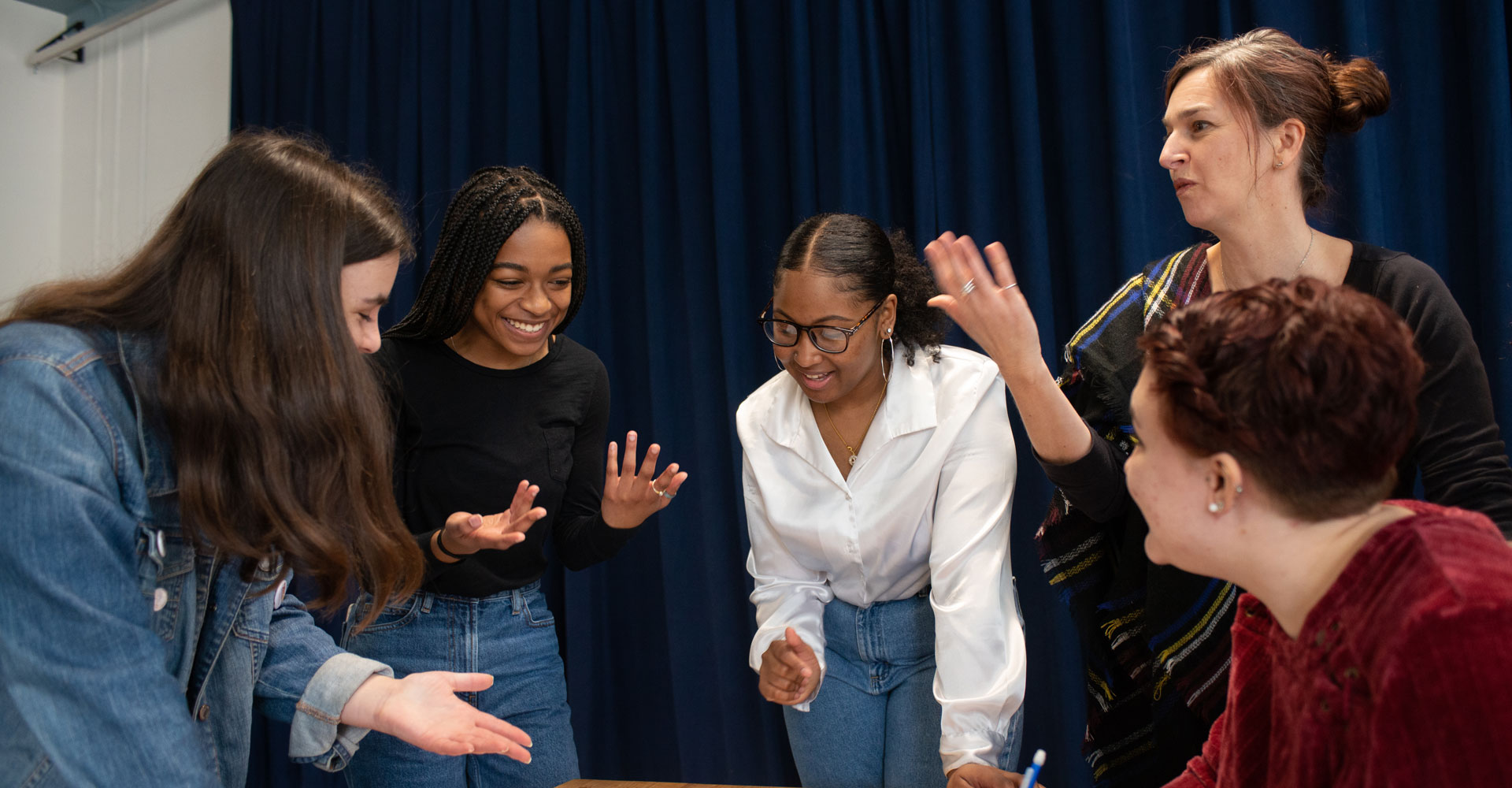 A group of students collaborating at their SCALE internship site.