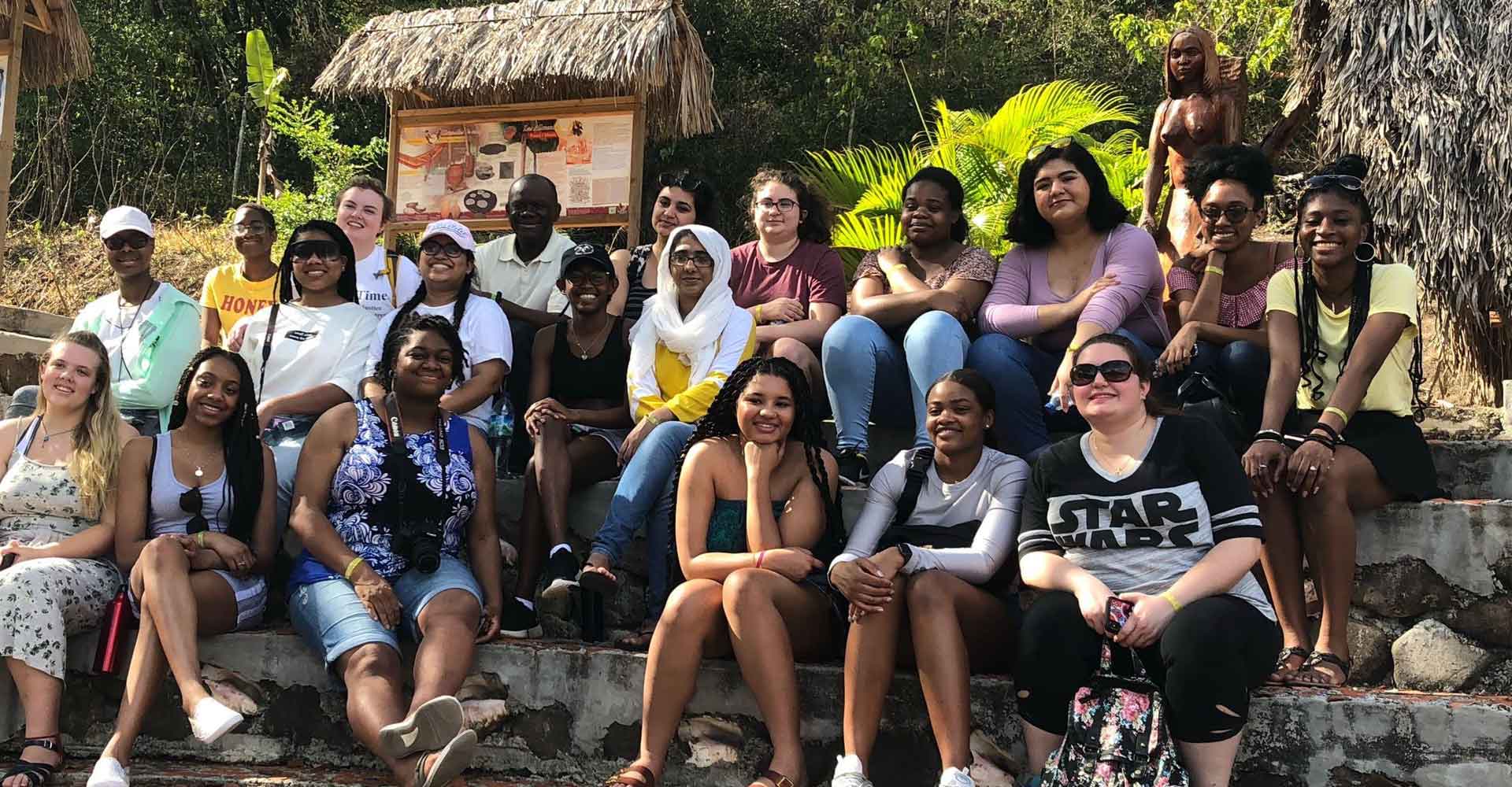 A group of Agnes Scott College students pose for a group photo in Martinique.